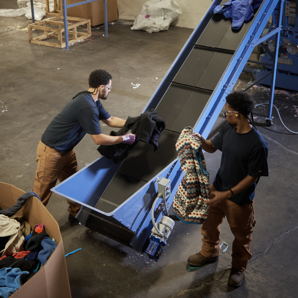 Circ warehouse employees processing clothing